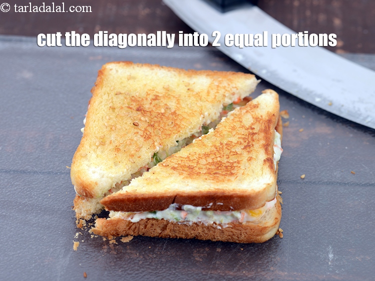 Step 27 – Cut the diagonally into 2 equal portions.