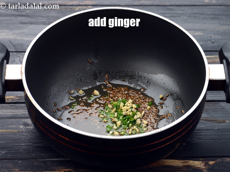 Step 20 – Add&nbsp;1/2 tsp&nbsp;finely&nbsp;<a href="https://www.tarladalal.com/glossary-chopped-ginger-786i">chopped ginger (adrak)</a>.&nbsp;