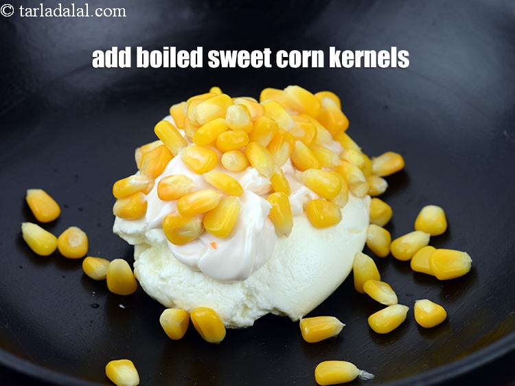 Step 6 – Add 1/4 cup <a href="https://www.tarladalal.com/glossary-boiled-sweet-corn-kernels-153i">boiled sweet corn kernels (makai ke dane)</a>.