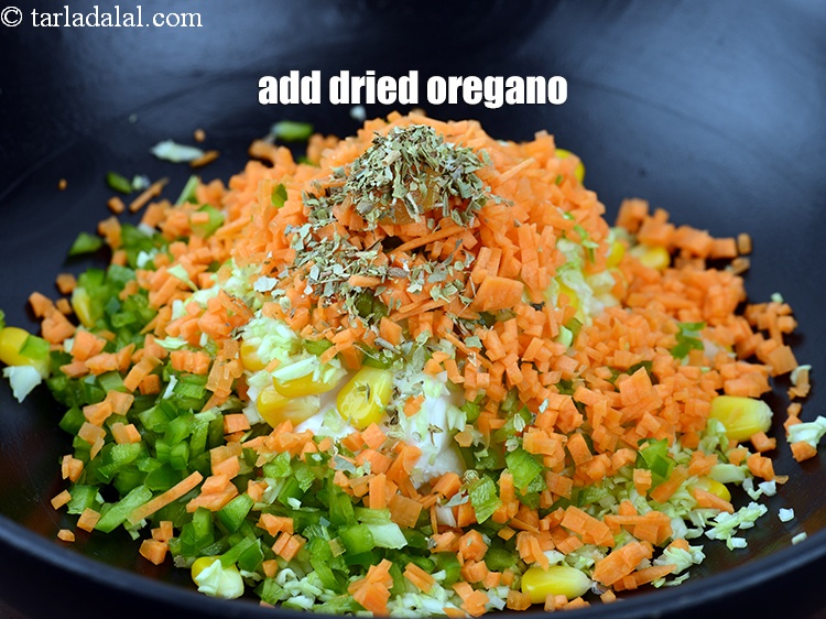 Step 11 – Add 1/2 tsp&nbsp;<a href="https://www.tarladalal.com/glossary-dried-oregano-268i">dried oregano</a>.