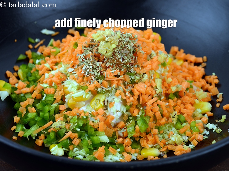 Step 12 – Add 1/2 tsp finely&nbsp;<a href="https://www.tarladalal.com/glossary-chopped-ginger-786i">chopped ginger (adrak)</a>.
