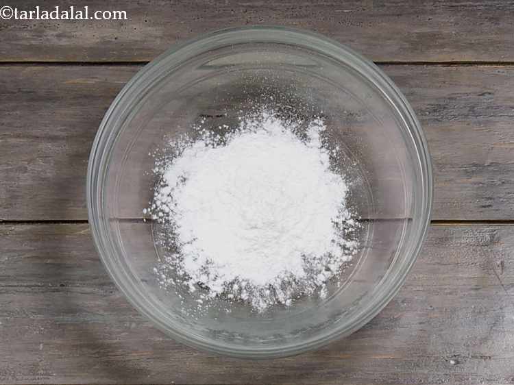 Step 1 – In a small bowl, take cornflour. Cornflour helps in thickening the sauce quickly.