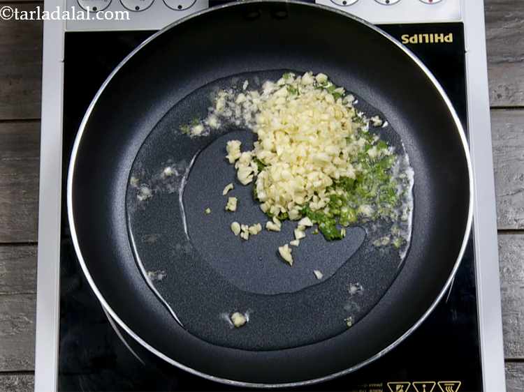 Step 12 – Now add garlic. If you find the quantity more then reduce as per your choice.