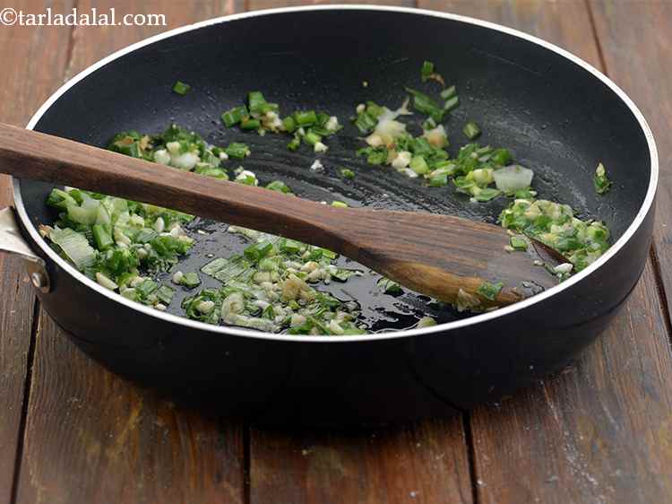 Step 14 – Add the spring onion whites and greens and saut? on a medium flame for 1 …