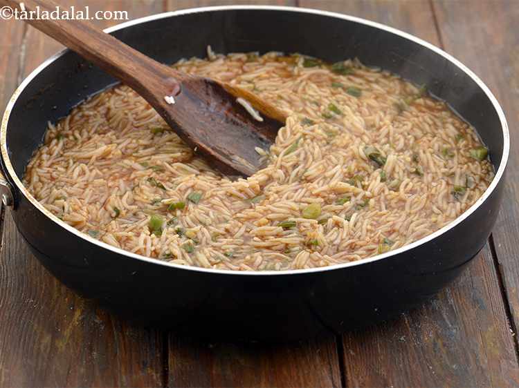 Step 16 – You will see the sauce has reduced beautifully. Add the rice and little salt, mix …