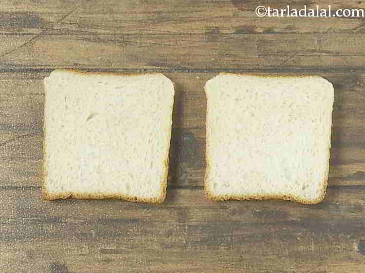 Step 9 – Place 2 bread slices on a clean, dry surface. We have used white bread. To …