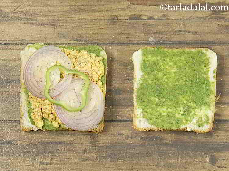 Step 13 – Place 1 capsicum slice over it. Sprinkle a little salt and pepper evenly over it. …