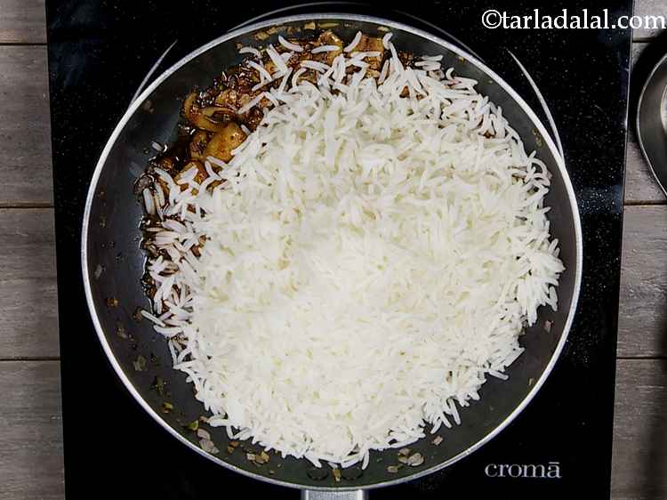 Step 31 – Add the cooked rice.