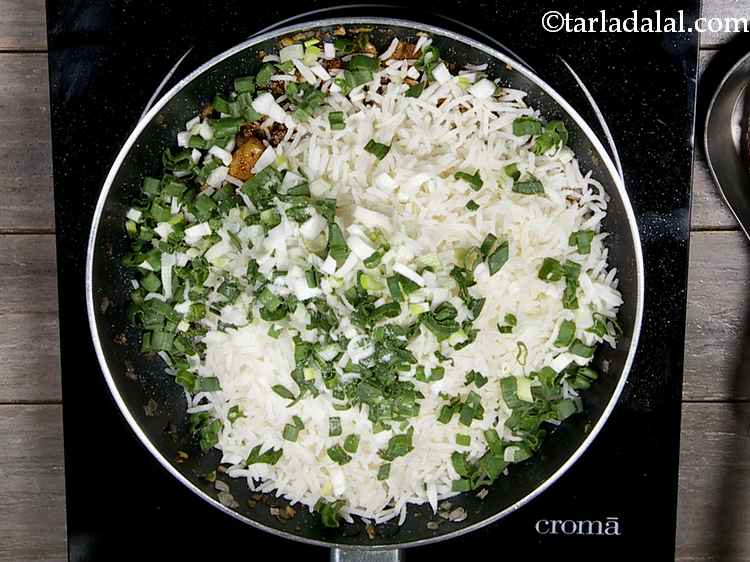 Step 32 – Add the spring onions, salt and black pepper powder, mix well and cook on a …