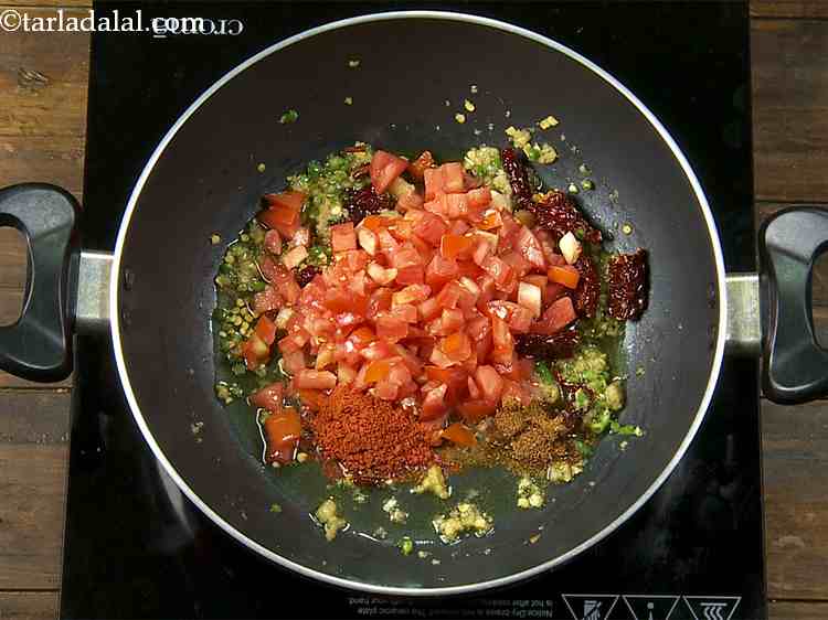 Step 14 – Now we will add the masalas one by one. Add the garam masala and chilli …