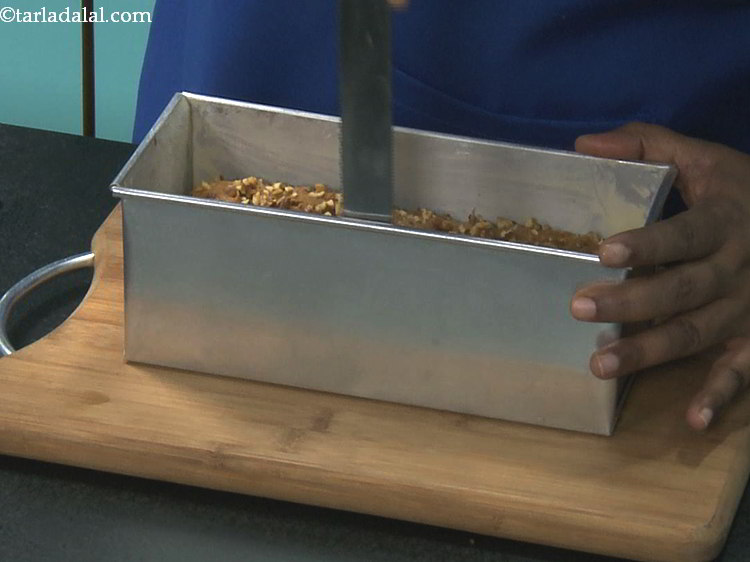 Step 27 – Loosen the sides of the&nbsp;<strong>date walnut cake (eggless date walnut cake)</strong>&nbsp;with the help of a …