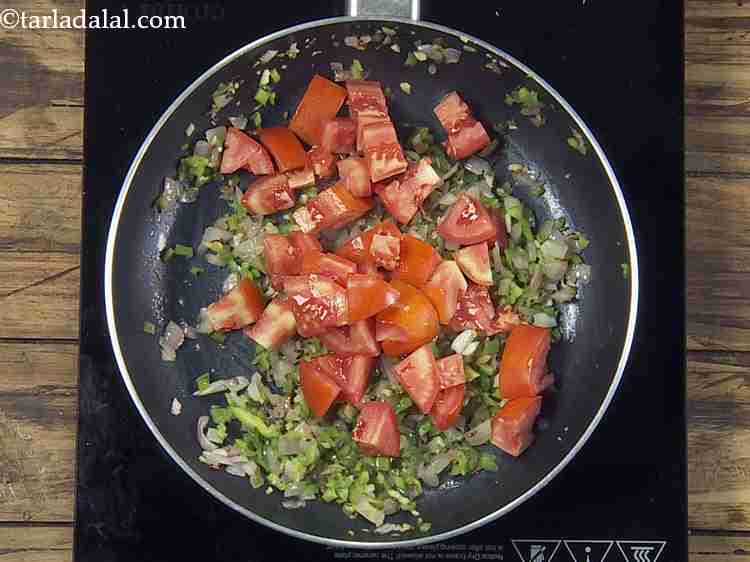 Step 8 – Add the tomato cubes. Ensure the tomatoes are fresh and ripe.