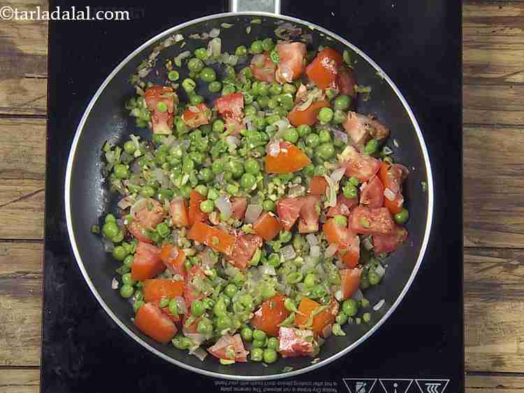 Step 9 – Add the green peas, mix well and cook on a medium flame for 2 minutes, …