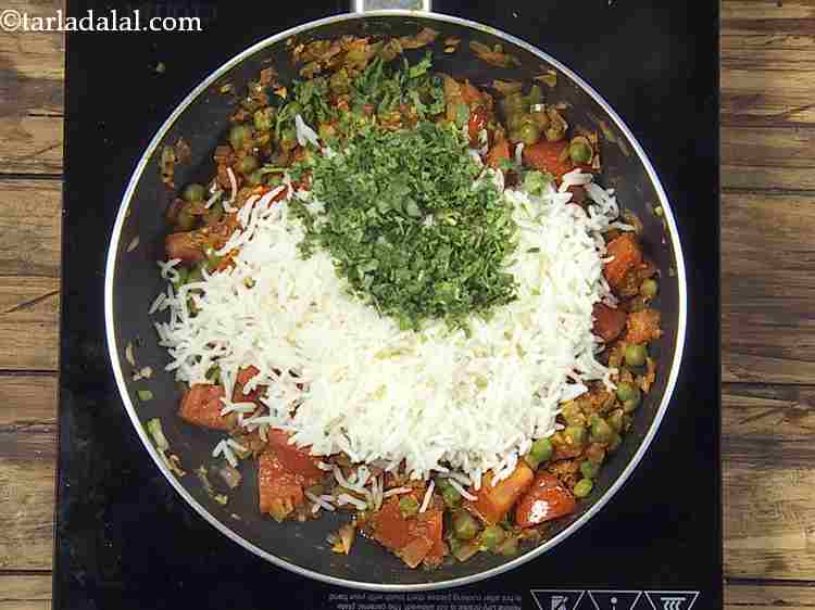 Step 12 – Add the cooked rice and coriander, mix well and cook on a medium flame for …