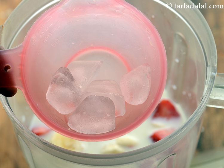 Step 20 – Add 5 to 6&nbsp;<a href="https://www.tarladalal.com/glossary-ice-cubes-752i">ice-cubes</a>.