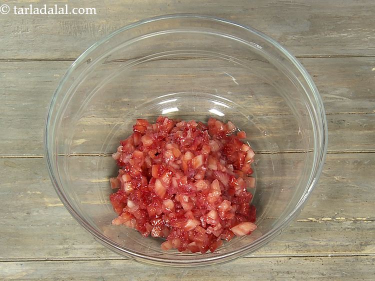 Step 4 – Cut strawberries roughly and transfer to a deep bowl to prepare the <strong>easy strawberry salsa …