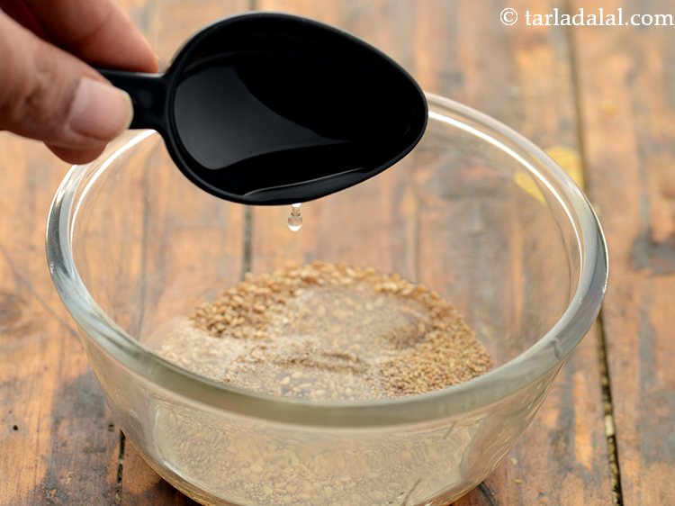 स्टेप 3 – जैतून का तेल डालें।