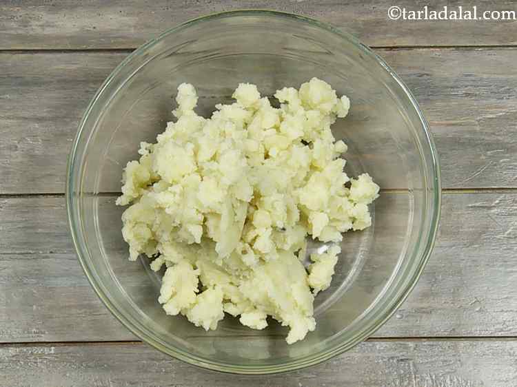 Step 1 – In a deep bowl, take boiled and mashed potatoes. You can also quickly grate them. …