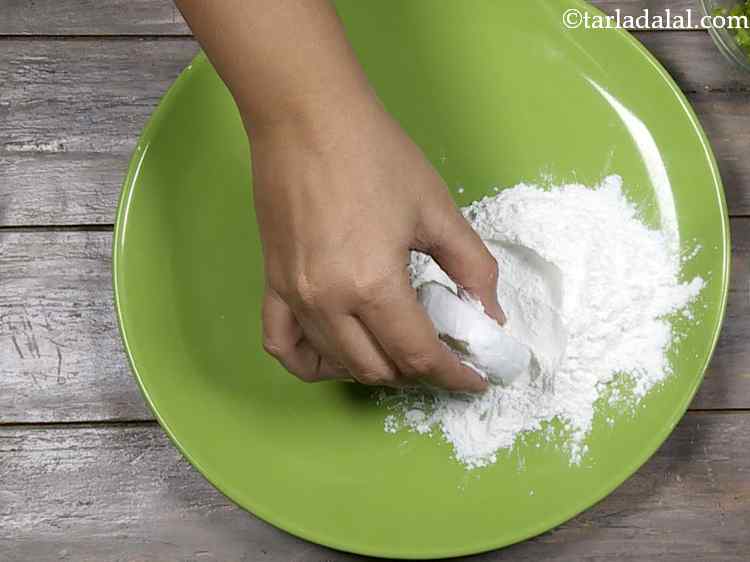 Step 16 – Roll it in cornflour till it is evenly coated from all the sides and make …