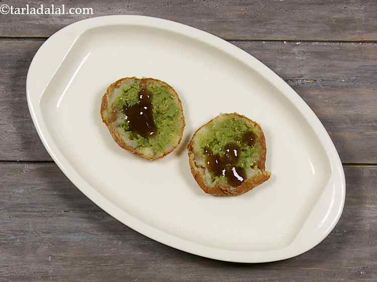 Step 23 – Top with ? tsp of sweet chutney over each halve. Pressure cooker <a href="/Khajur-Imli-ni-Chutney-(-Gujarati-Recipe)-571r">Khajur Imli …