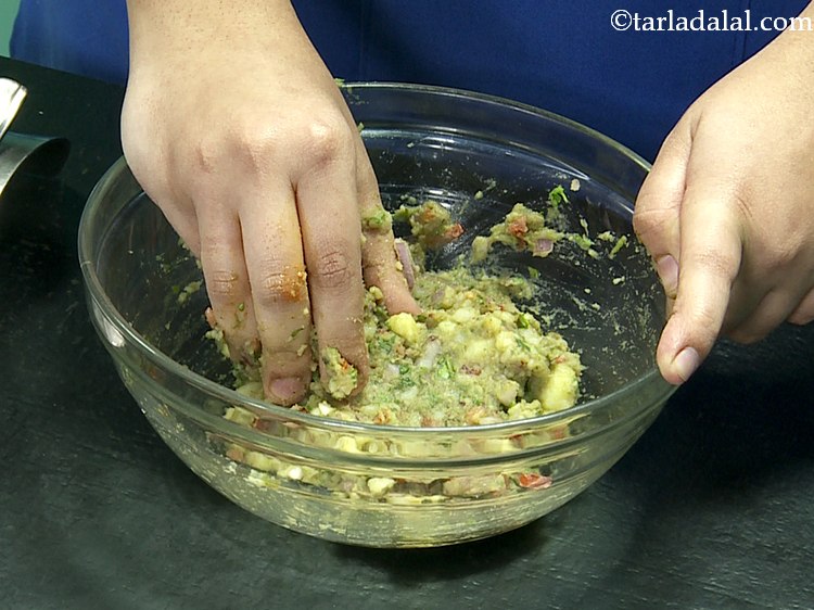 Step 11 – Add salt &amp; mix well. Our stuffing for the&nbsp;<strong>Monaco Biscuit Sev Puri</strong>&nbsp;is ready.