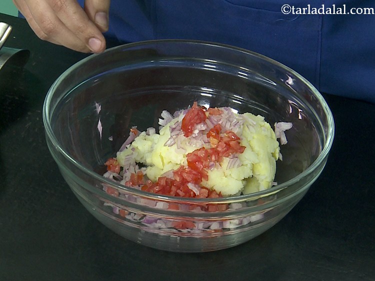Step 5 – Add the tomatoes. If in season, you can also add some raw mangoes.