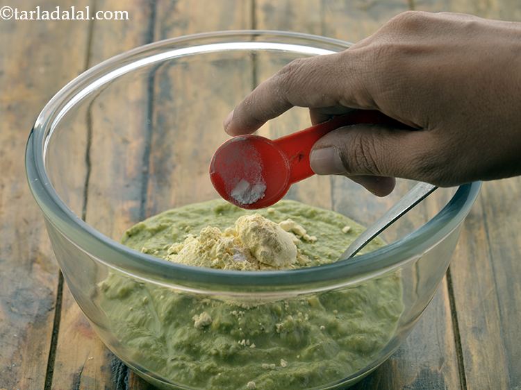 Step 12 – Futher, add a pinch of baking powder. The soda help in making the soft moong …