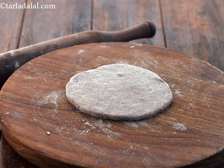 Step 23 – Roll out again into a 125 mm. (5") diameter circle using a little whole wheat …