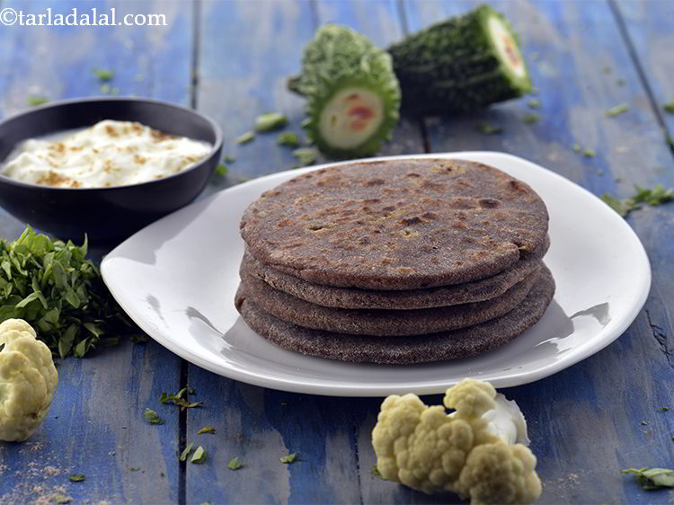 Step 27 – Serve <strong>stuffed nachni roti |&nbsp;stuffed nachni roti with cauliflower, karela, methi&nbsp;|&nbsp;healthy ragi paratha |&nbsp;</strong> hot …