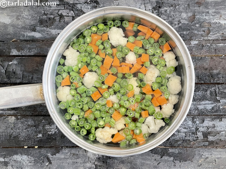 Step 6 – Add the mixed vegetables.