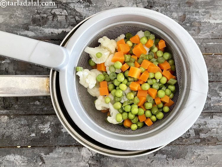 Step 8 – Drain and you boiled mixed vegetables are ready to use in the sabzi.