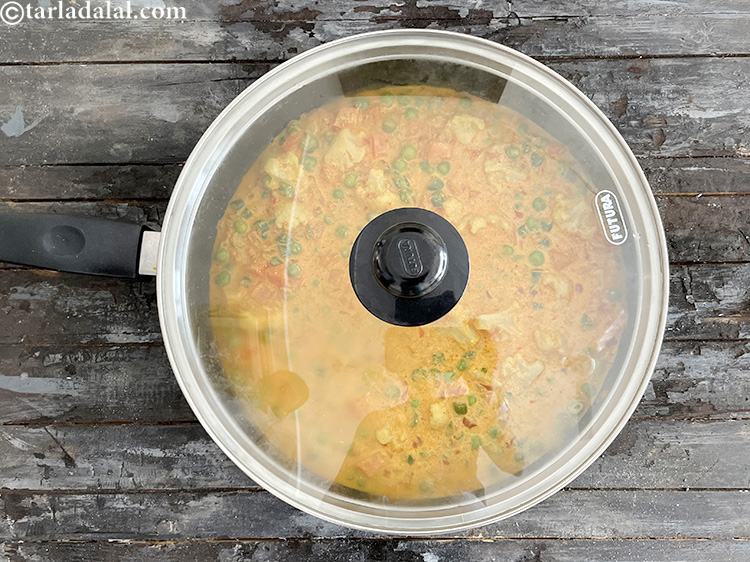 Step 35 – <meta charset="UTF-8" /> Cover and cook on a slow flame for another 3 to 4 …