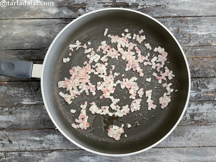 Step 21 – Saut&eacute; on a medium flame for 2 to 3 minutes or till they turn translucent.