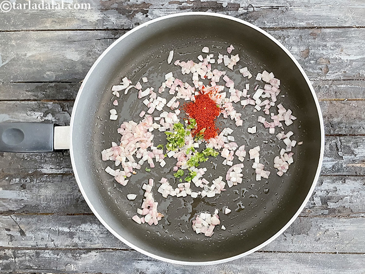 Step 23 – Add&nbsp;<meta charset="UTF-8" />1 tsp&nbsp;<a href="glossary-chilli-powder-red-chilli-powder-339i">chilli powder</a>.