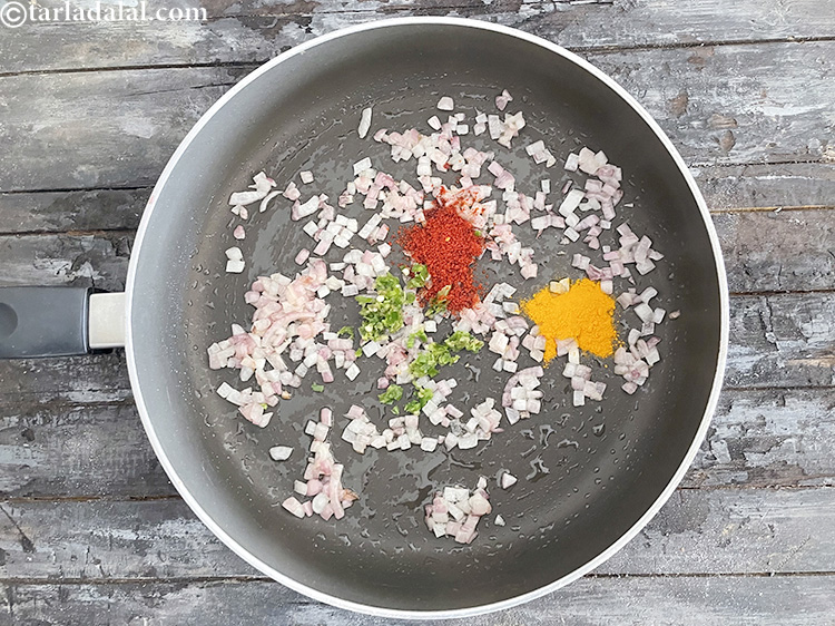 Step 24 – Add&nbsp;<meta charset="UTF-8" />1/2 tsp&nbsp;<a href="glossary-turmeric-powder-haldi-645i">turmeric powder (haldi)</a>.