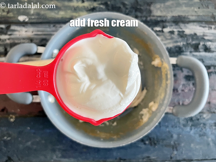 Step 12 – Add&nbsp;<meta charset="UTF-8" />1/4 cup&nbsp;<a href="glossary-fresh-cream-1877i">fresh cream</a>.