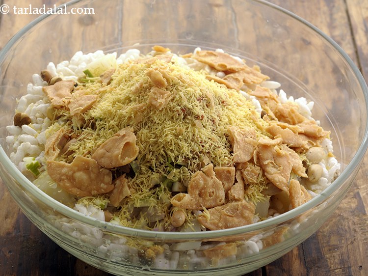 Step 21 – Add crushed papdis and salt.