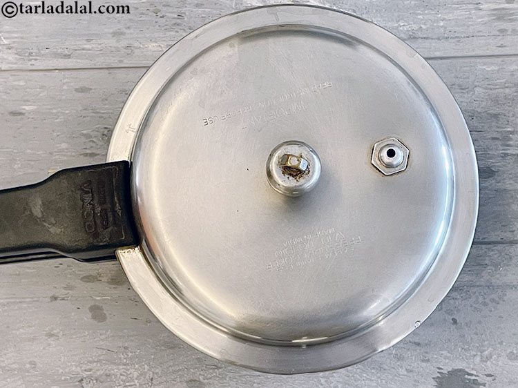 Step 8 – Pressure cook for 3 whistles.