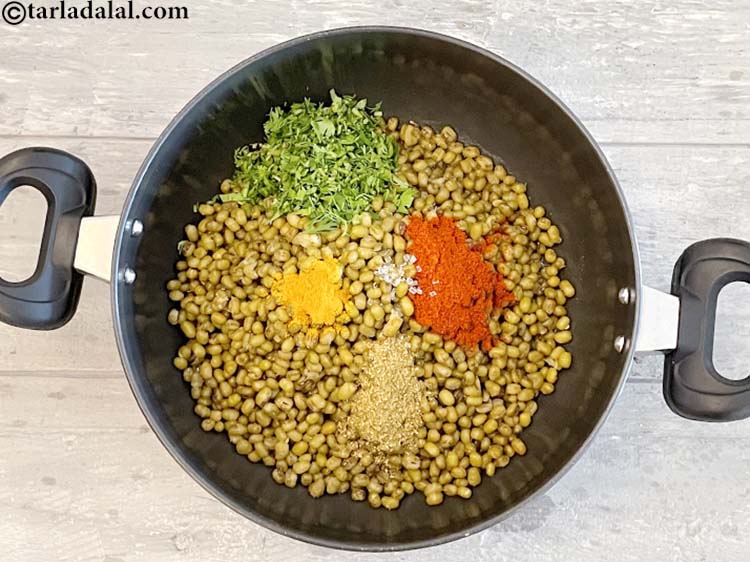 Step 21 – Add&nbsp;<meta charset="UTF-8" />2 tbsp&nbsp;finely&nbsp;<a href="glossary-chopped-coriander-783i">chopped coriander (dhania)</a>.