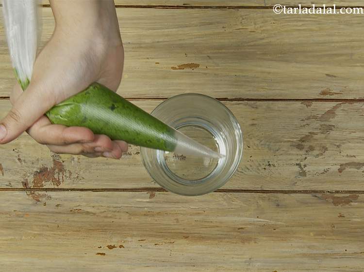 Step 9 – Squeeze the filled piping bag to get out any air bubbles. Then twist the end …