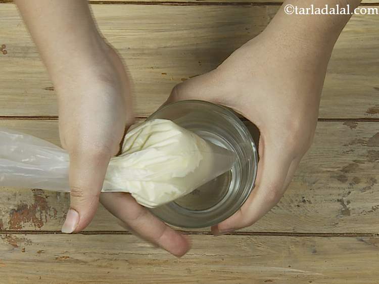 Step 19 – Squeeze the filled piping bag to get out any air bubbles. Then twist the end …