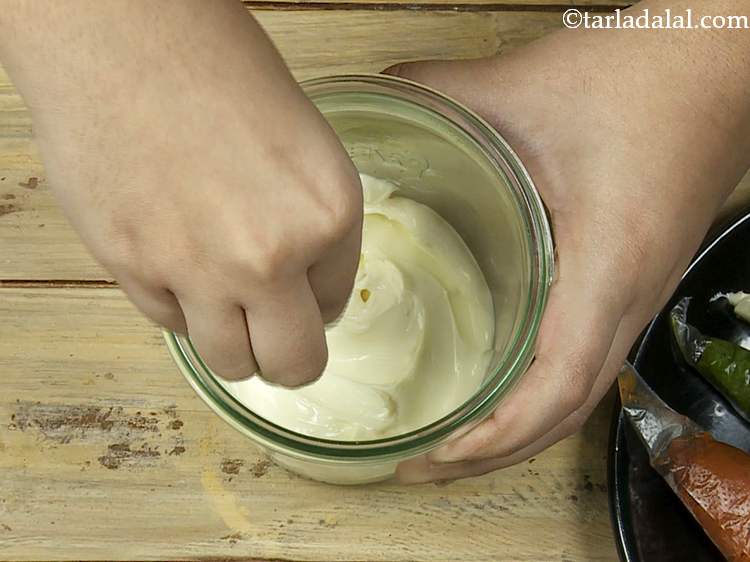 Step 22 – Using a small spoon, spread it evenly to form a smooth layer.