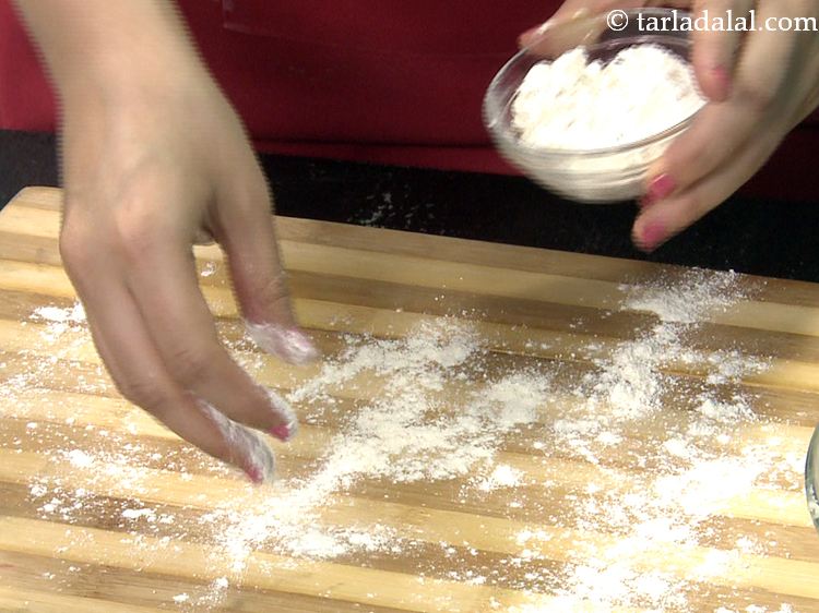 Step 44 – Sprinkle the plain flour over a smooth, flat surface. This can be a big chopping …