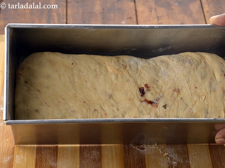 Step 47 – Place the dough in a greased bread loaf tin.&nbsp;<br /> &nbsp;