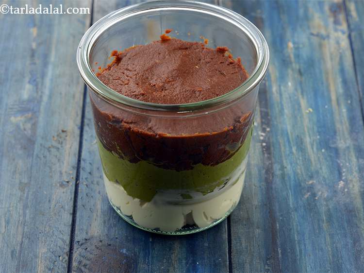 Step 26 – Using a small spoon spread&nbsp;<strong>Sun-Dried Tomatoes, Pesto and Cream Cheese Cold Dip</strong>&nbsp;evenly and refrigerate it …