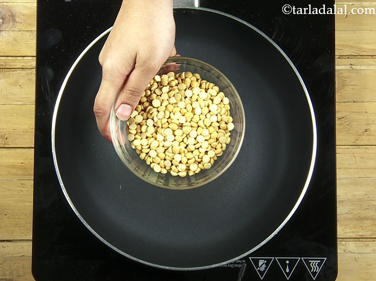 Step 3 – For preparing the mixture for <strong>suran chana dal tikki</strong>, heat a broad non-stick pan, add …