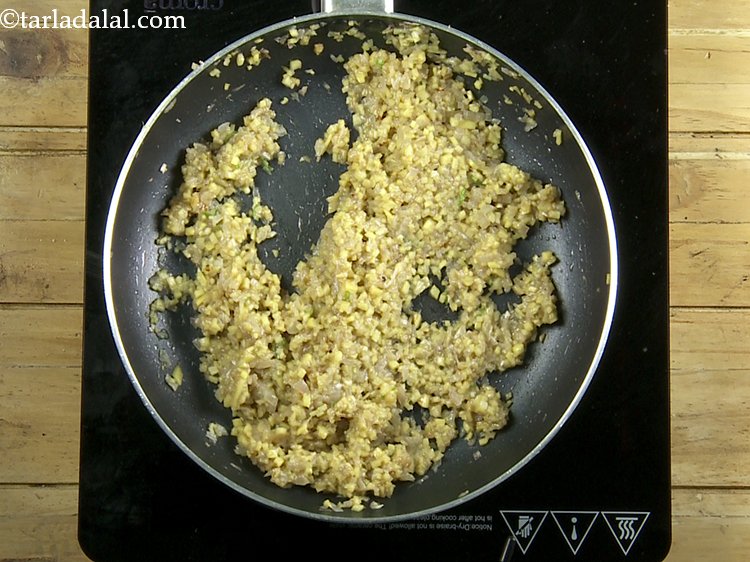 Step 13 – Mix well and cover it with a lid and cook on a low flame for …