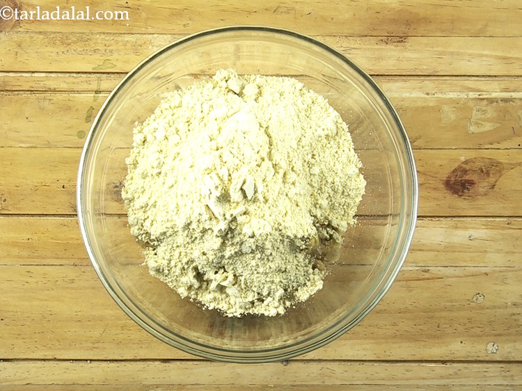 Step 16 – Add the prepared chana dal powder. It helps in binding together all the ingredients well.