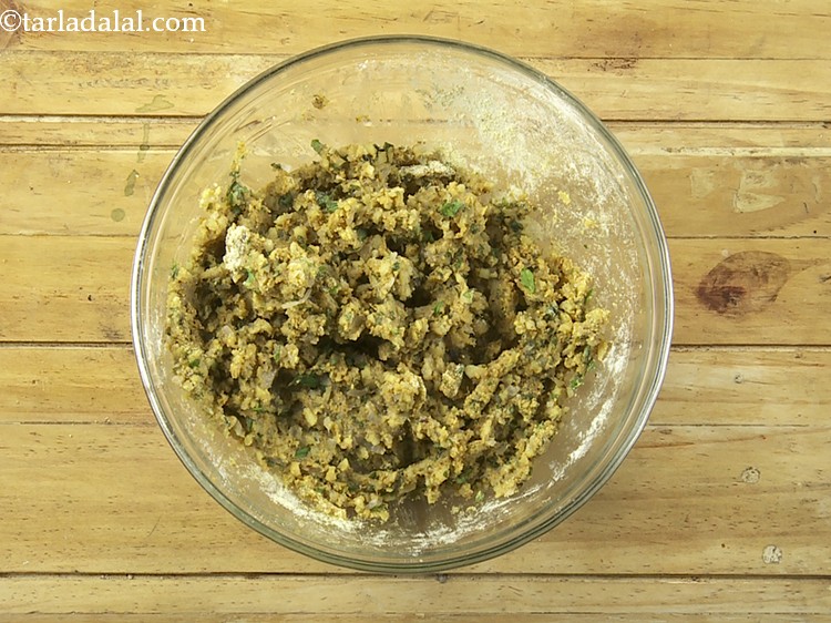 Step 20 – Mix well and our <strong>suran chana dal tikki</strong> mixture is ready!