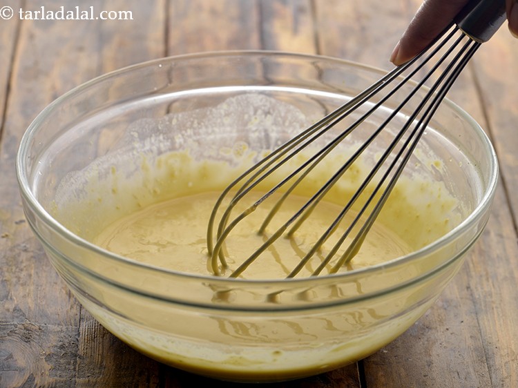 Step 13 – Mix well using a whisk until no lumps remain to form a thick yet flowing …